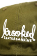 Czapka z daszkiem Krooked - Skript Snapback  (brown/white)